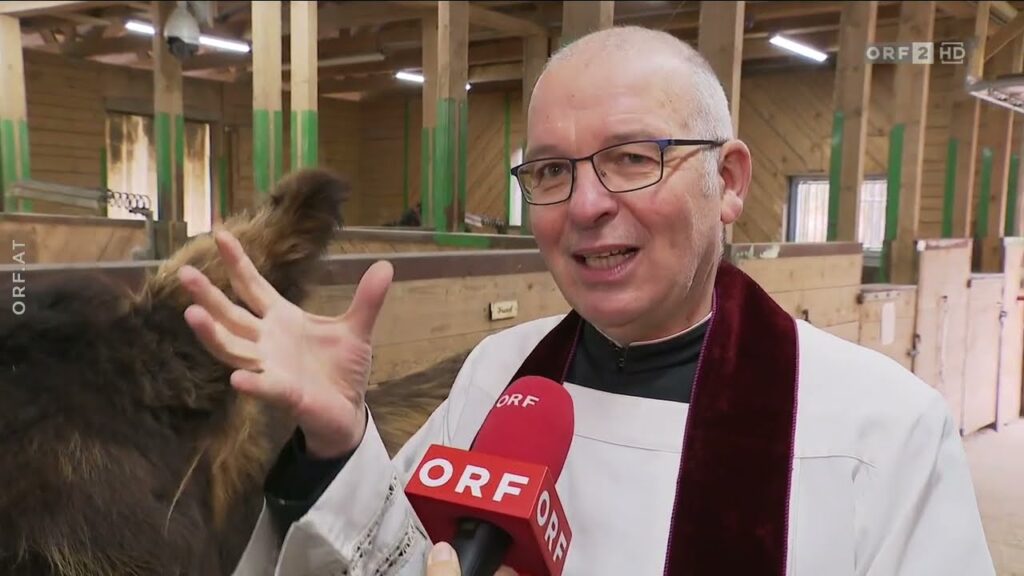 Esel wandert zur Palmweihe